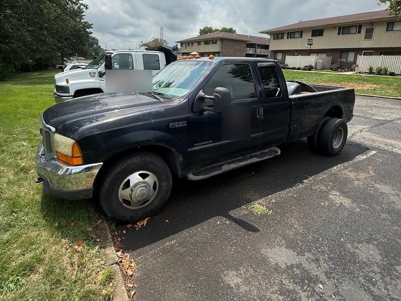 Black Ford F-350 dually work truck bought by Try Auto Way, car buyer in Princeton NJ